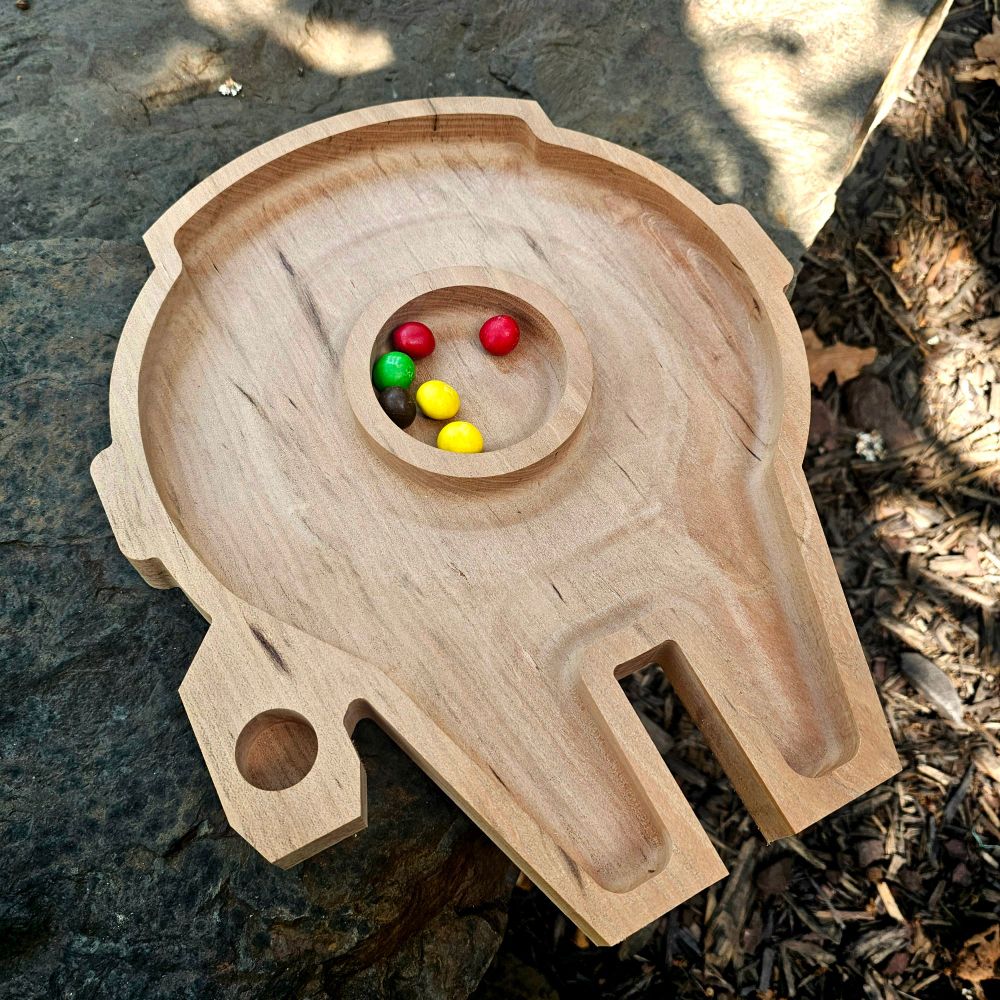 A candy tray shaped like a space ship.