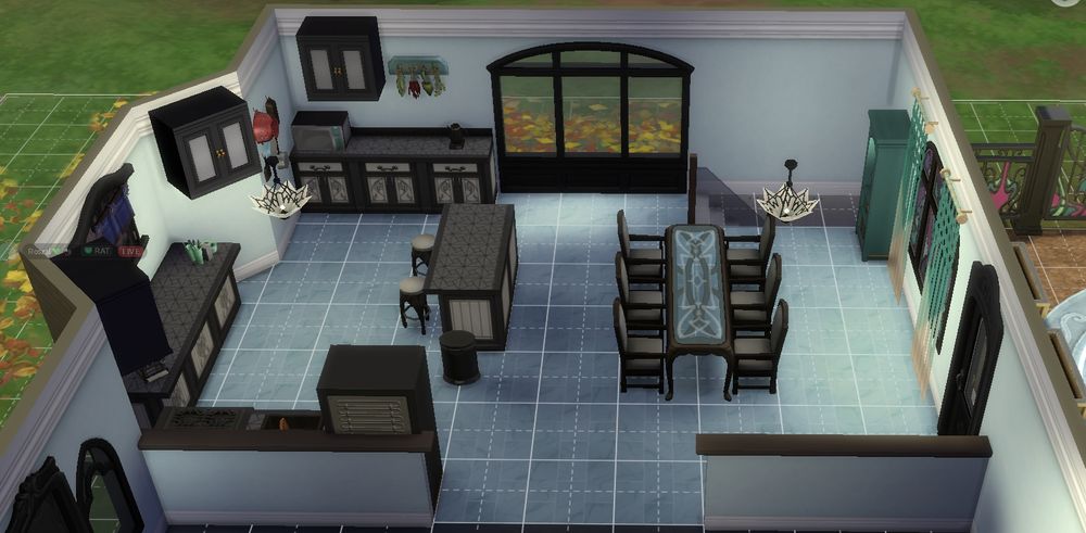 ahot of the kitchen and dinning room of the house, the wall and floor colors are light while the counters and furniture are dark