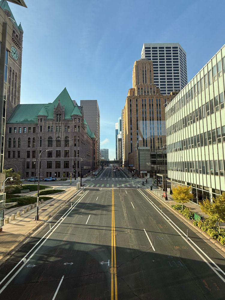 view of downtown Minneapolis over 3rd Ave S from a skyway