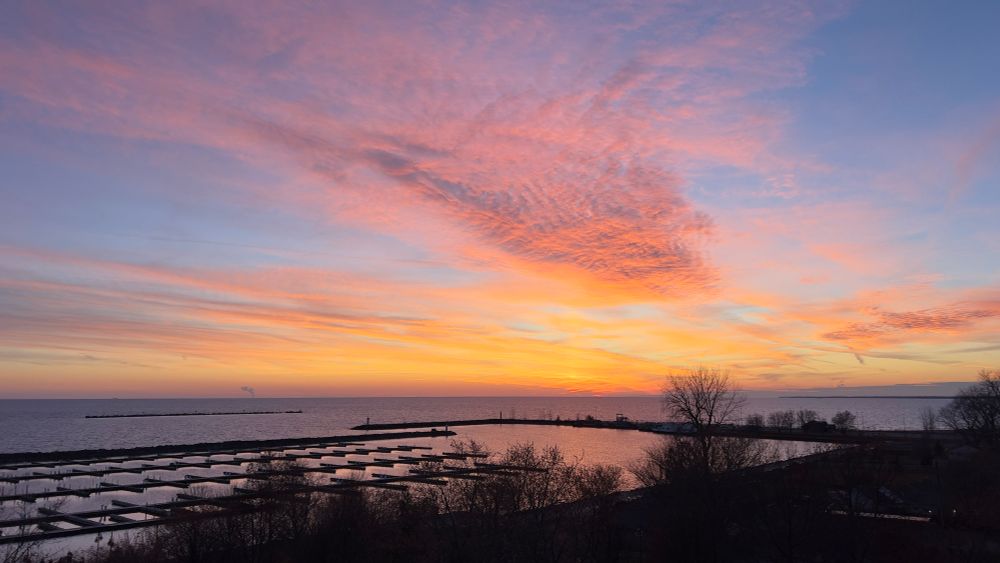 Orange, pink and purple sunset over the lake. 