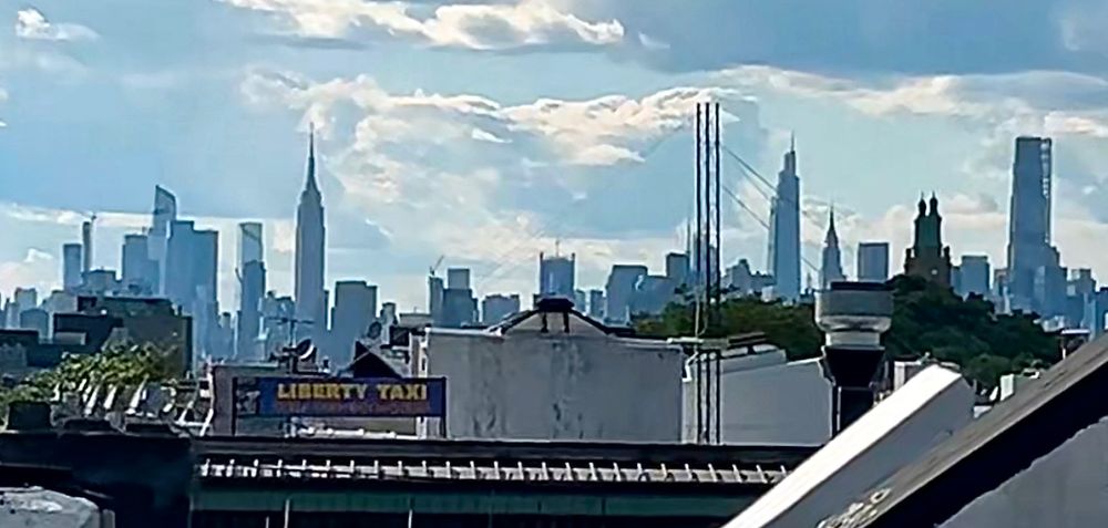 Manhattan skyline view from Ridgewood, Queens rooftop. 
