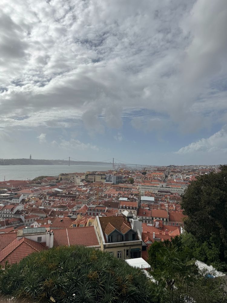 A glance of scenic Lisbon with Vasco da Gama Bridge from afar