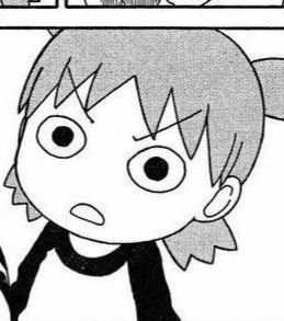 Yotsuba, a little girl with four pigtails, stares at the camera with wide eyes and angry eyebrows, as though about to deliver a scolding 