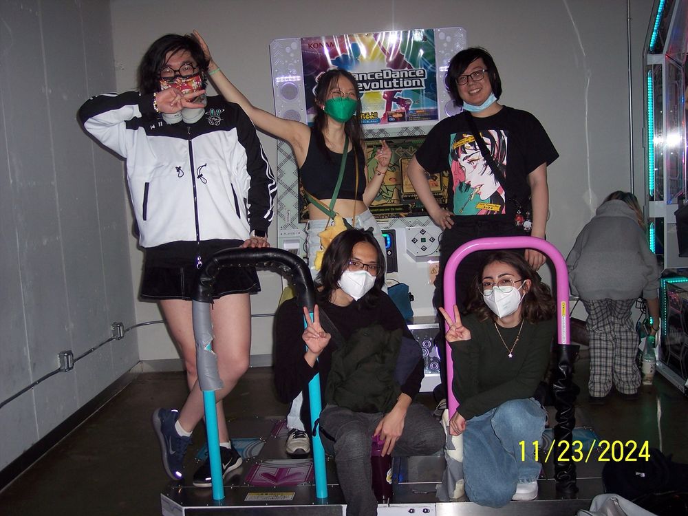 left to right - me, starapture, andi, Andrew, and eli. were posing on a DDR cab