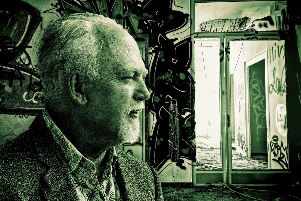 Maybe Day 2025 image - from RAW SEMANTICS. Detailed hi-res image of Robert Anton Wilson in a graffitied building.