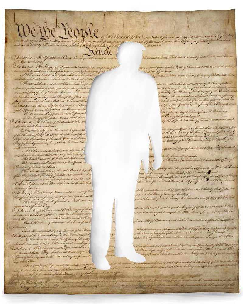 Illustration of the US Constitution with a hole in the shape of Donald Trump torn out of the center. 