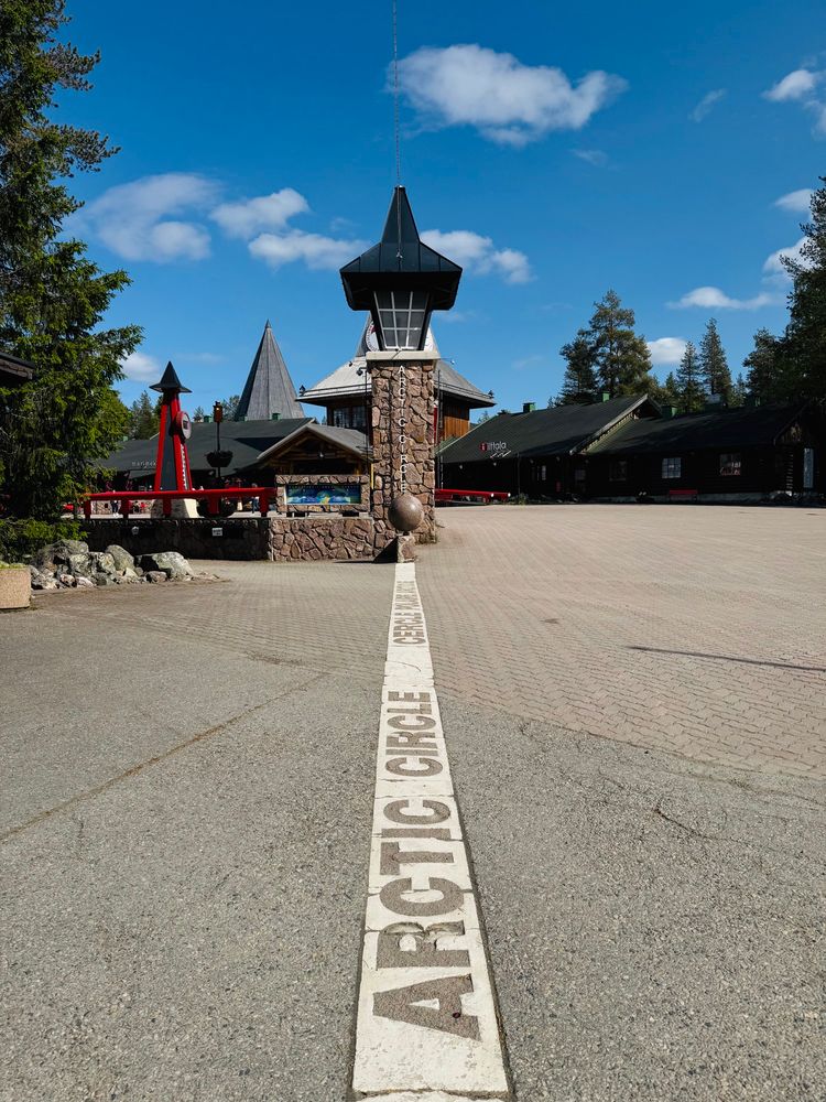 Photo from Santa Claus Village with the Arctic Circle line down the centre of the image.