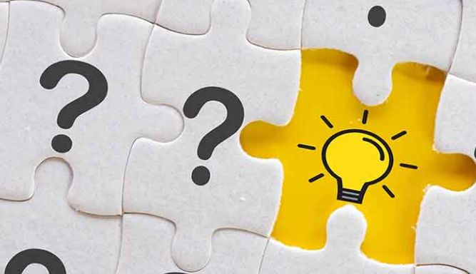 Image of question marks and a yellow lightbulb