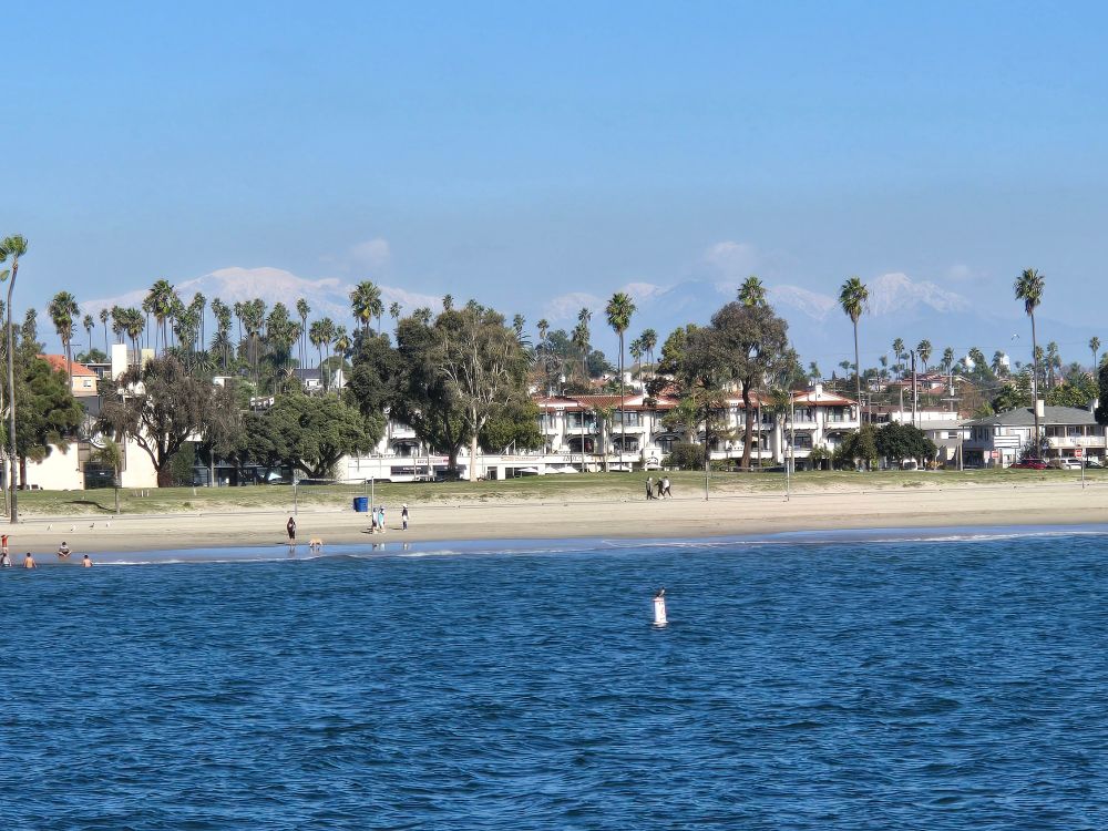 View of Long Beach from the Veterans Memorial Pier. Snow called mountains in the distance. 