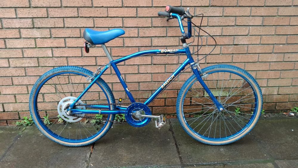 A blue Raleigh Bomber bike. 