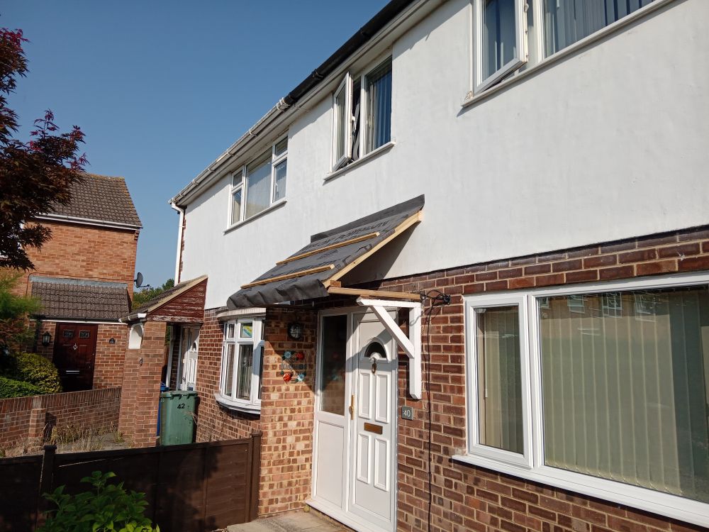 A partially-completed porch, with all framing done, ready for tiles to go on tomorrow. 