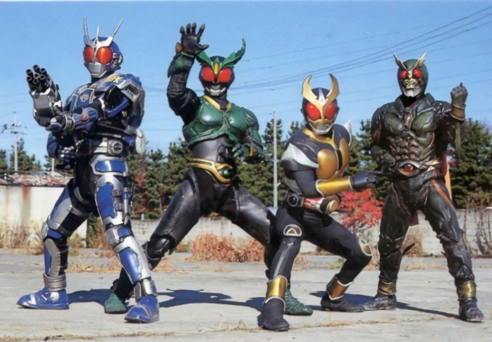 Kamen Rider G3-X, Kamen Rider Gills, Kamen Rider Agito, and Kamen Rider Another Agito, from the show, Kamen Rider Agito, posing at an empty concrete lot. 