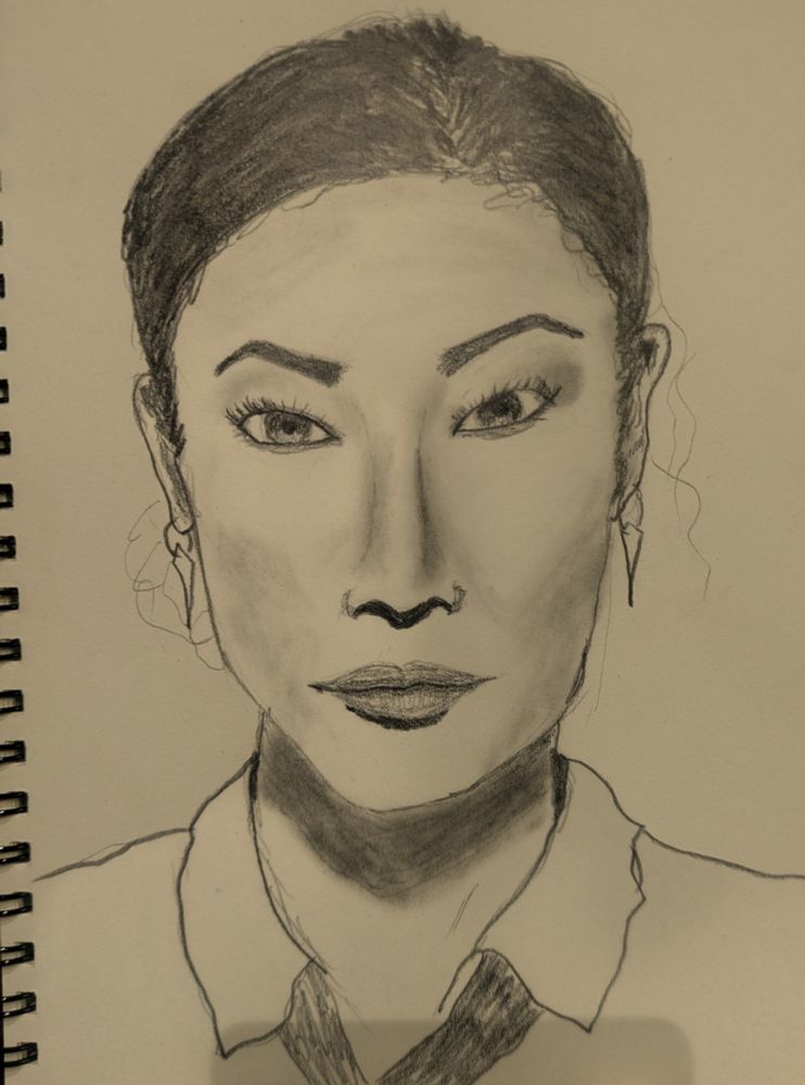 A graphite drawing of a Korean woman's face that MOSTLY has the eyes in the correct place 🫣