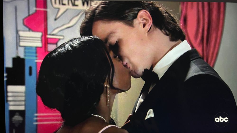 Close up of a man and woman kissing 