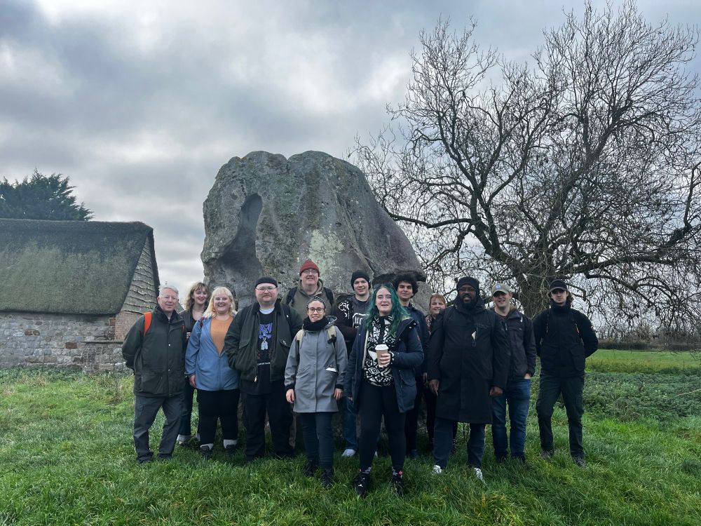 Happy Birkbeck students at The Cove in the weak Autumn sunshine.