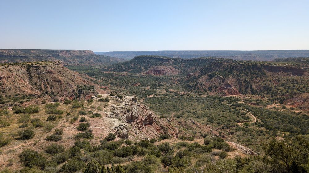 A view from the Palo Duro Canyon visitor's center along the rim of the canyon. It looks out over a beautiful example of how expansive this place is, as it's the second largest canyon in the US, only behind the Grand Canyon itself.