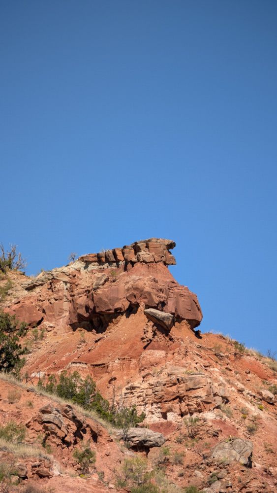 A cool looking rock formation that I saw. It's shape reminds me of some sort of rock golem with an elongated, pointed helmet like that you'd see in some art-deco imagery.