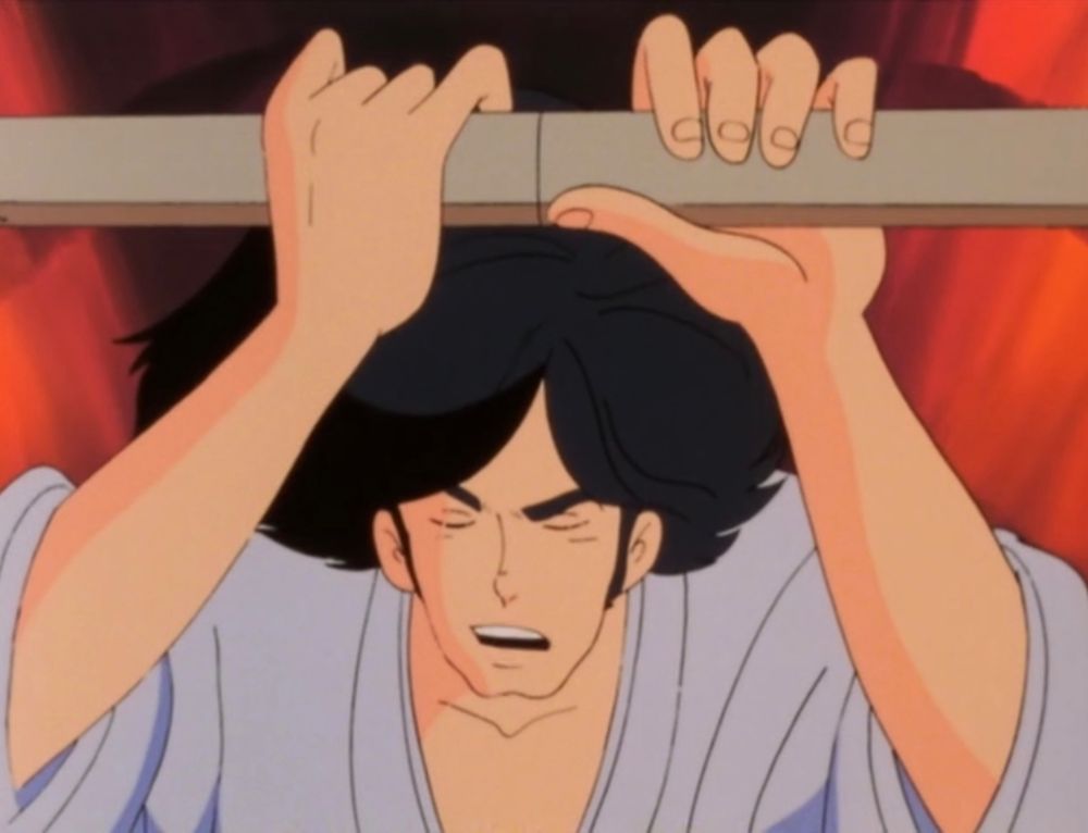 A handsome samurai closing the sheath of his sword