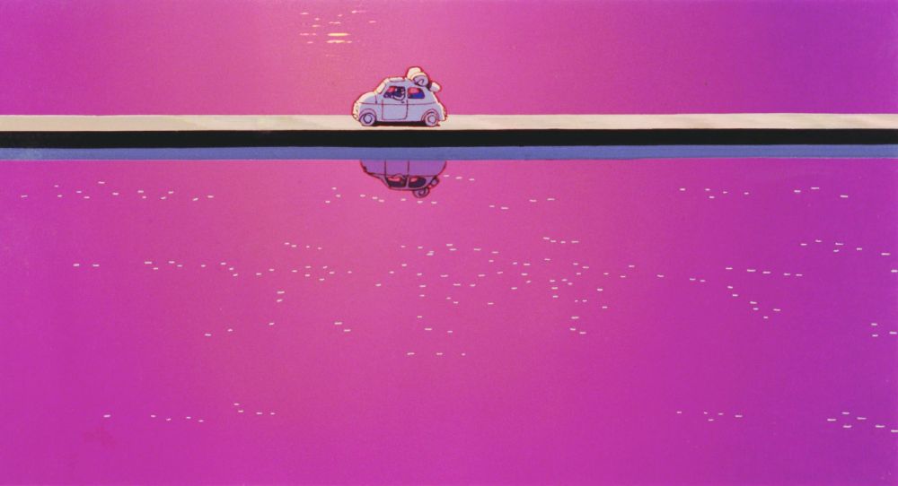 A Fiat 500 on a long bridge across the water.