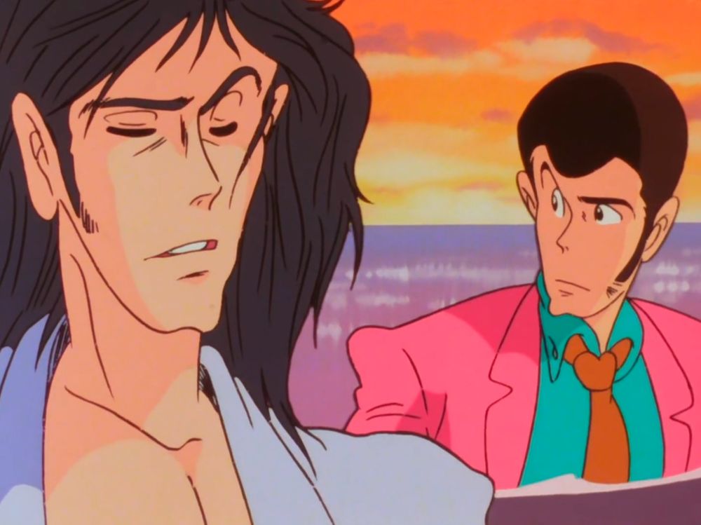 Two handsome men treading water. The one on the left has shoulder-length hair and is wearing a kimono. The one on the right is wearing a pink jacket, teal shirt, and orange tie. Both have sideburns.