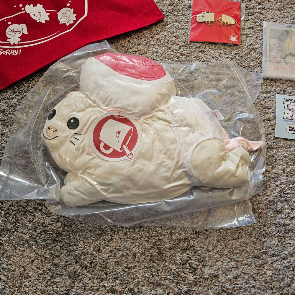 A closer picture of the Todd plush from the previous picture, allowing further examination of the vacuum sealed, flattened form of the possum character
