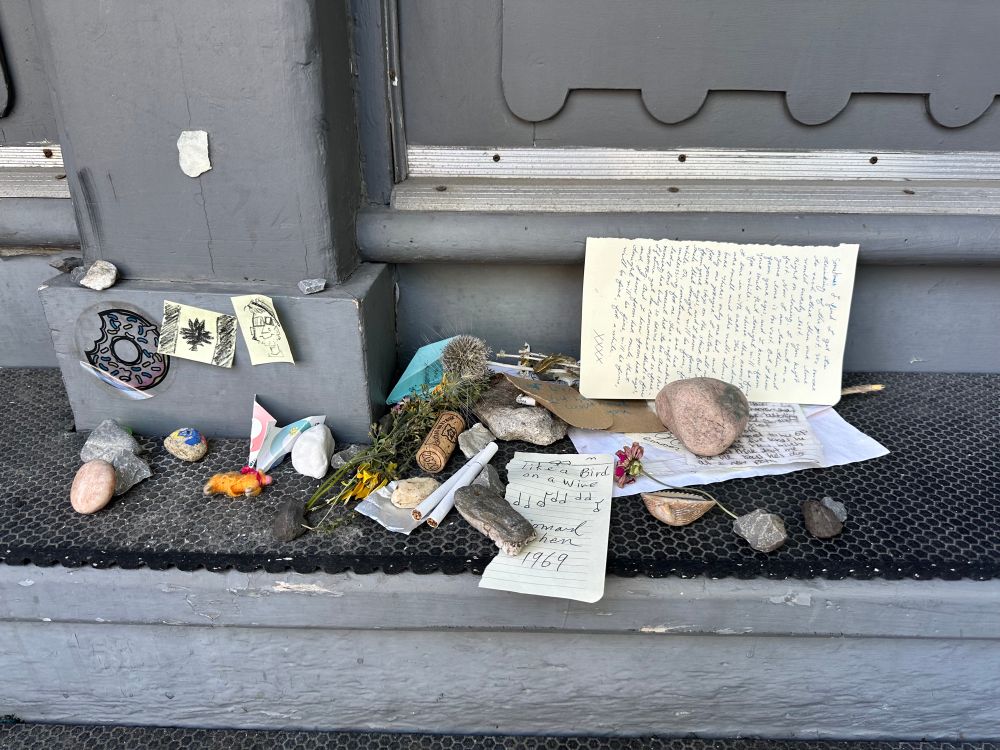 Letters and gifts in memory of Leonard Cohen, left on his doorstep. 