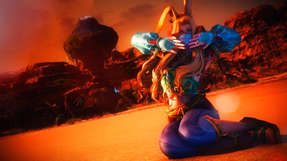 Kaiyle lays in the sands of the Oasis wearing a Gerudo Tunic ripped from Legend of Zelda Breath of the Wild. You can see the oasis and sunset in the distance.