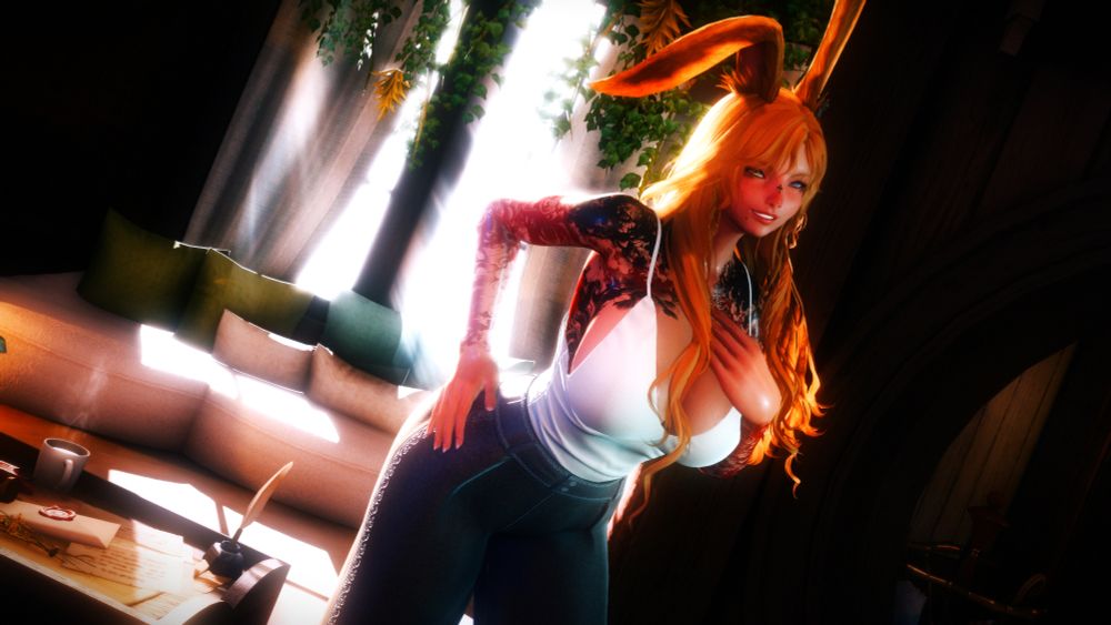 Kaiyle is standing in her house. She is wearing a white top and black pants. She has one hand on her hip and the other on her chest. 