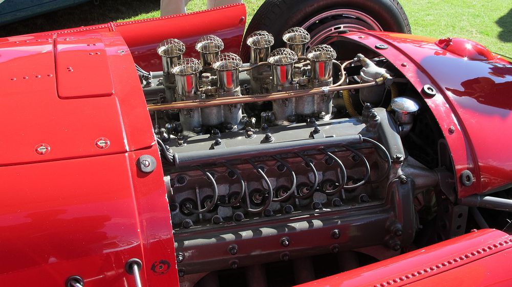 The V8 engine from a Lancia F1 car, with cleaning chrome ‘trumpet’ inlets