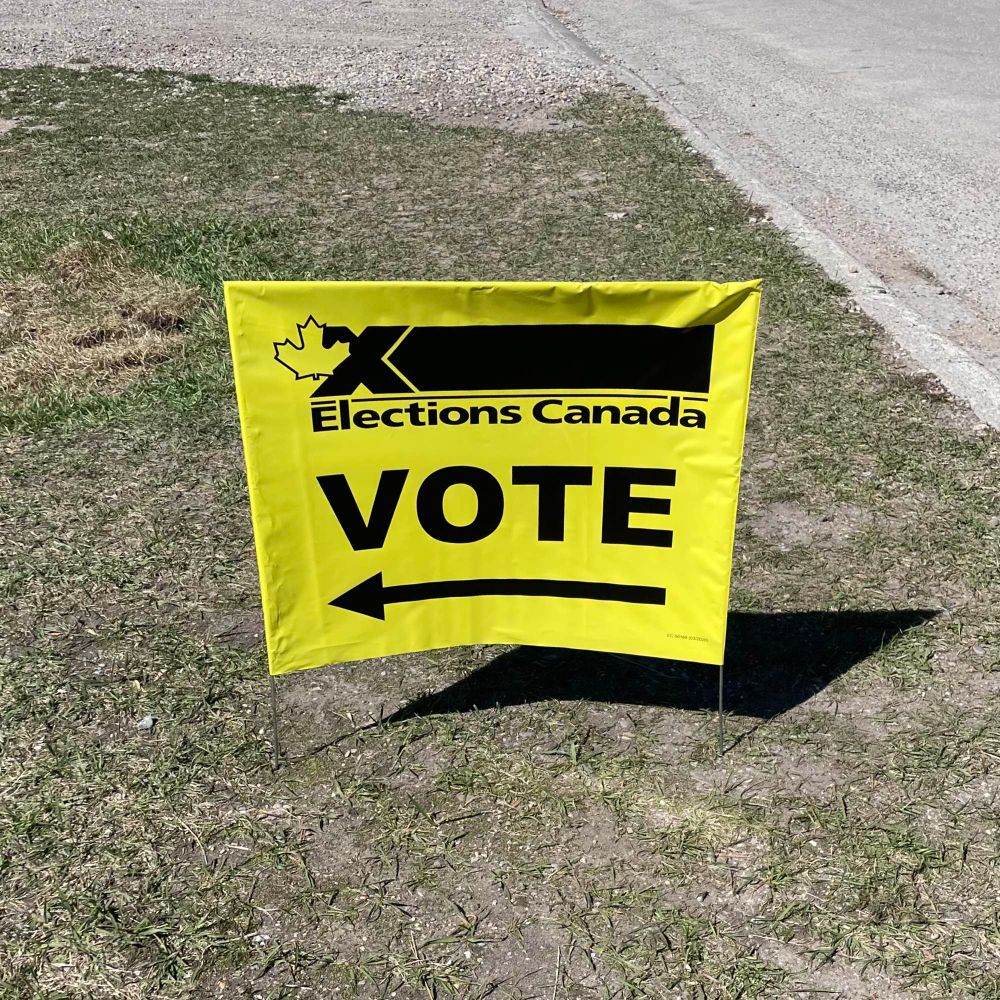 Yellow elections Canada vote sign