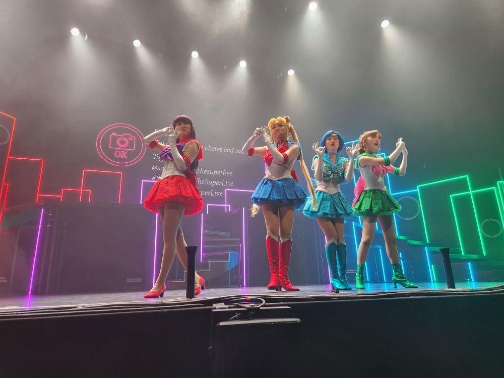 Sailor Mars, Sailor Moon, Sailor Mercury and Sailor Jupiter signaling it’s okay to photograph and to use a hashtag -photo by my friend Luna