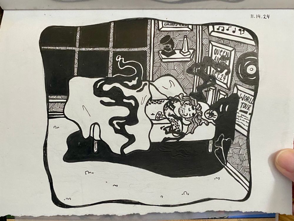 A photo of a pen and ink drawing of Ed asleep on a bed with a monster (Stede) coming up from under the bed as a shadow