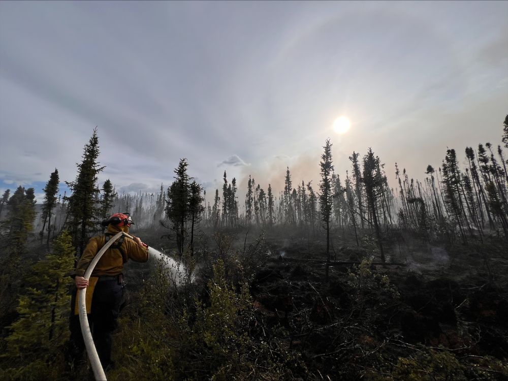 Eagle crew working on extinguishing hotspots on the Sulfur Creek fire (DA-025), on July 7, 2025.
