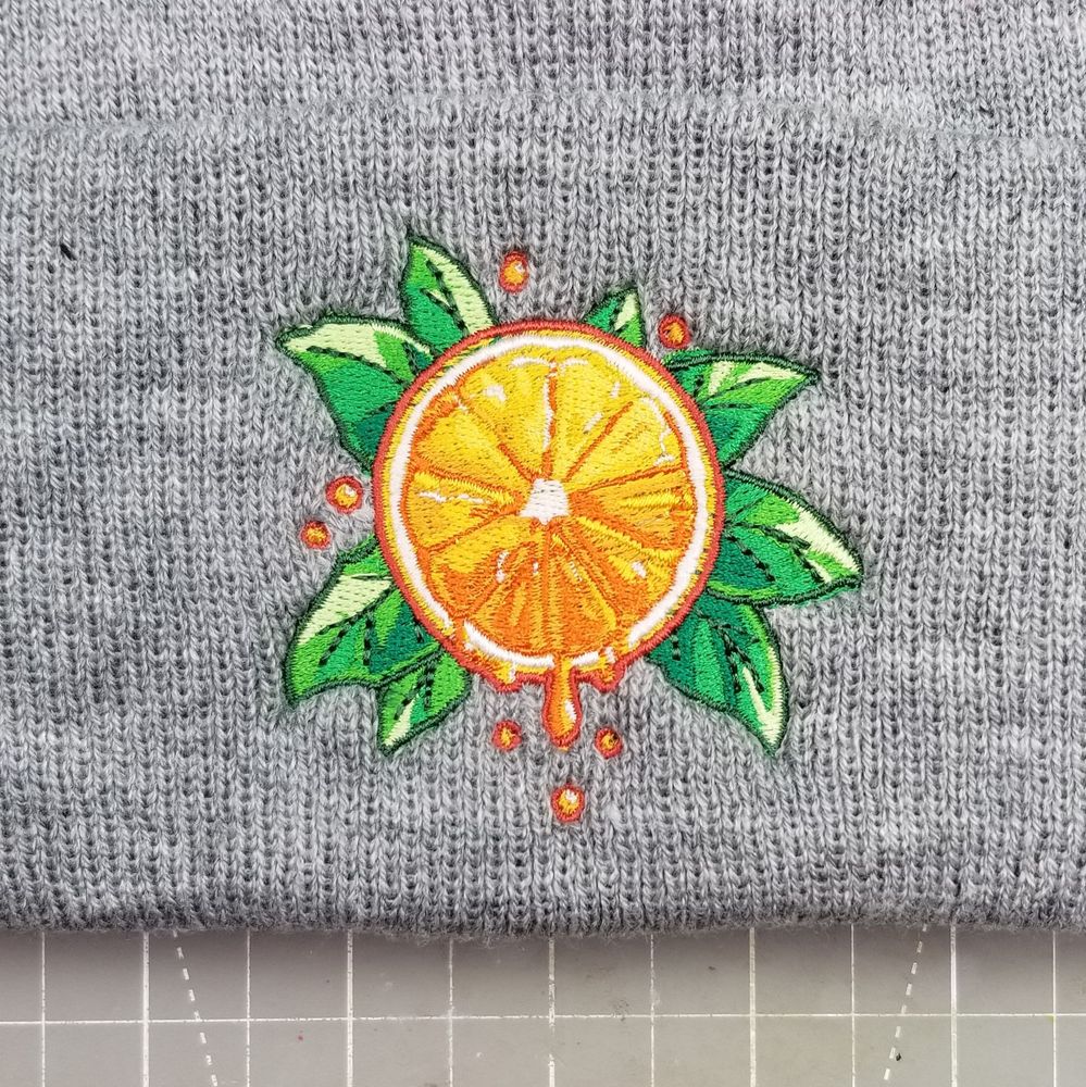 A machine embroidered version of my design, digitized in Wilcom Studio and embroidered on a Barudan industrial embroidery machine. 