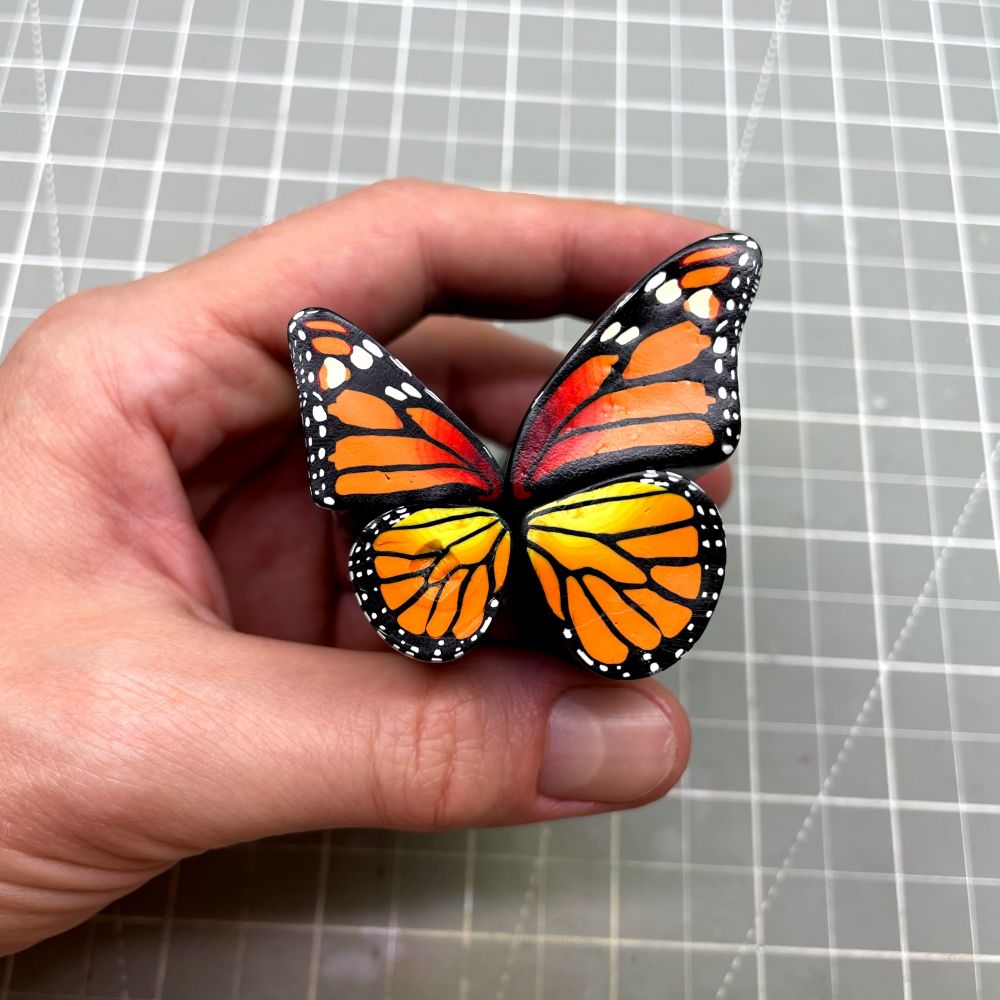 The inside of my Butterfly cane reduced down to 2" and 1.5" tall. The bottom wing is upside down but because of symmetry I can straighten it out when I slice the canes then I can flip things around.