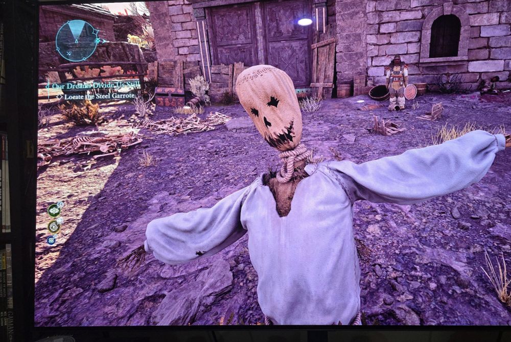 A scarecrow saying hello.