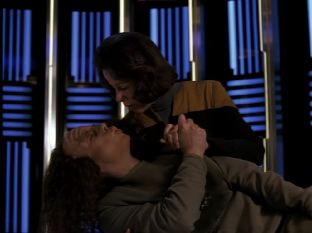 human b'elanna has a yuri moment with klingon b'elanna & is clasping her hand 