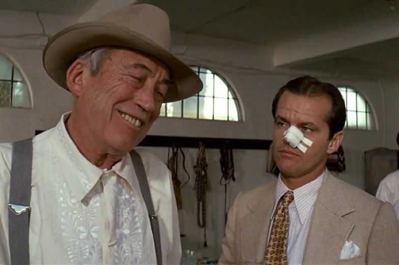 John Huston and Jack Nicholson in Chinatown (1974)