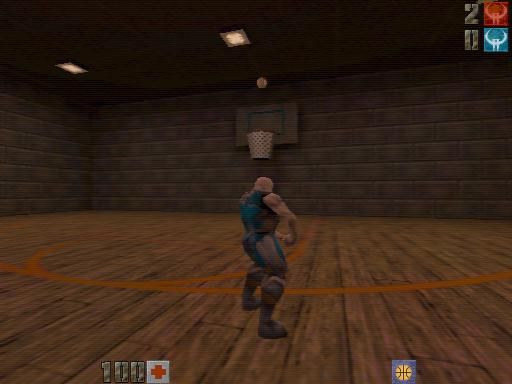 A Quake 2 character from behind standing in a basketball court.
