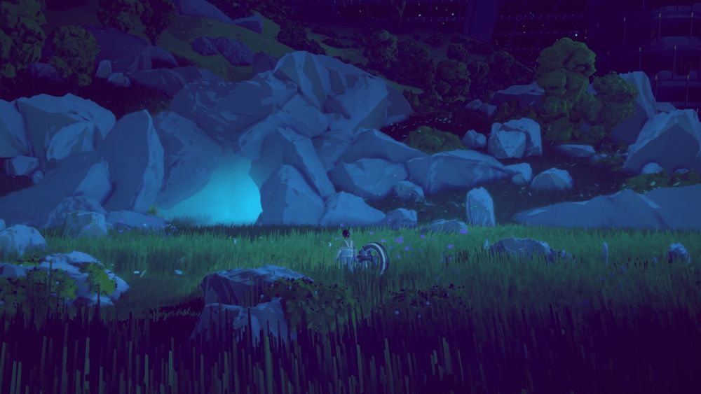 A screenshot of the upcoming game Generation Exile featuring a person standing in a field of tall grass. The environment is framed by large boulders flanked by hearty trees.