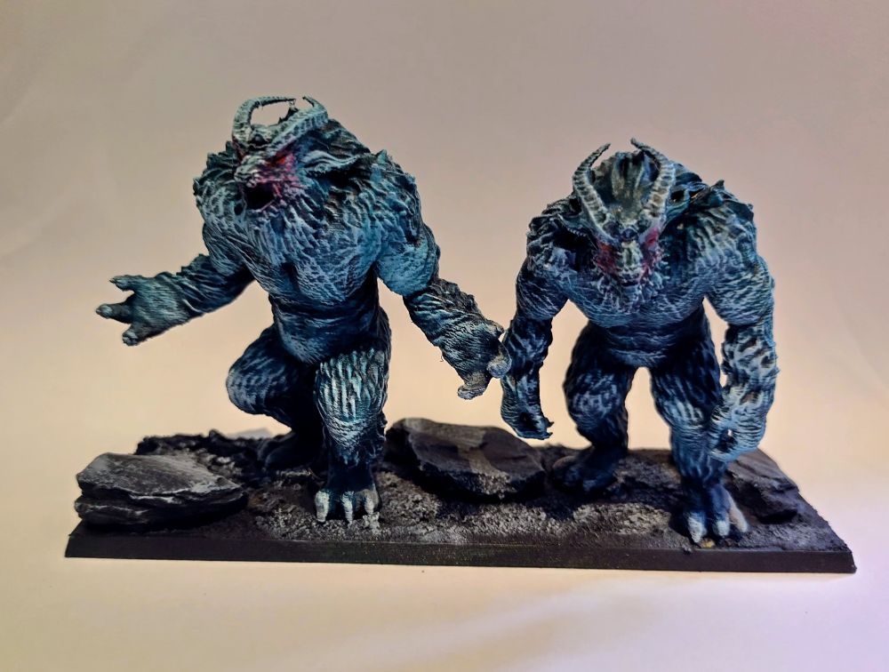 Forest trolls for my KoW halfling army on a black and white base 