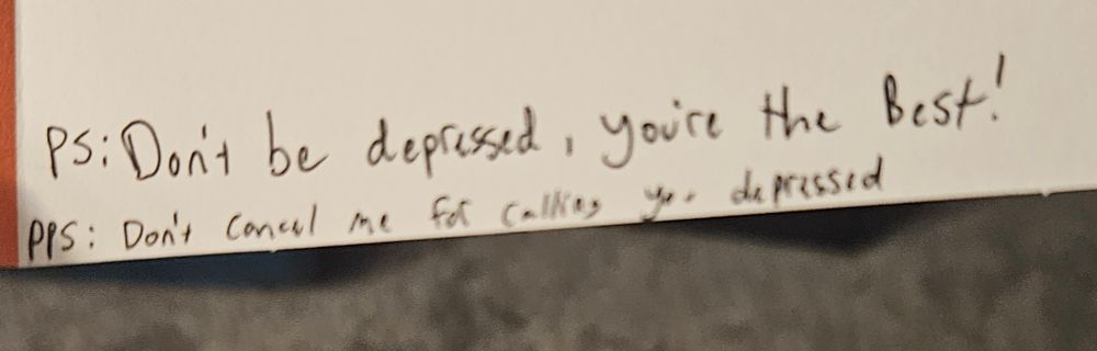 Picture of a card from a friend that says 