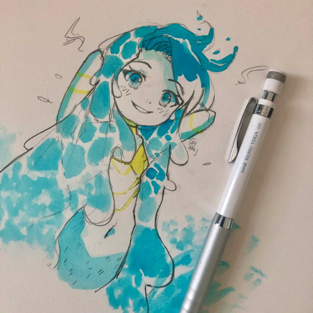 A mermaid character rising out of the water, smiling. Her hair is made from water and flows down from her head down her shoulders. Her tail is blue as is her hair and is wearing gold trimmed outfit.