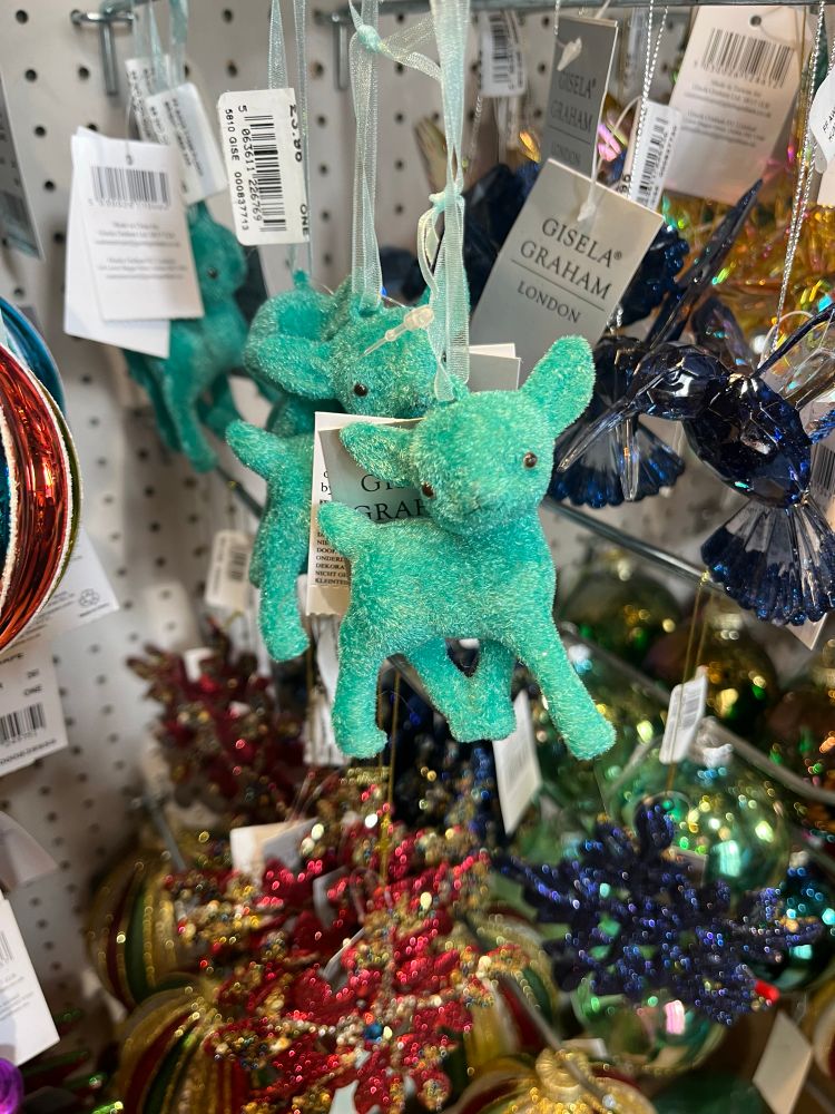 A bright green slightly melty looking flocked fawn