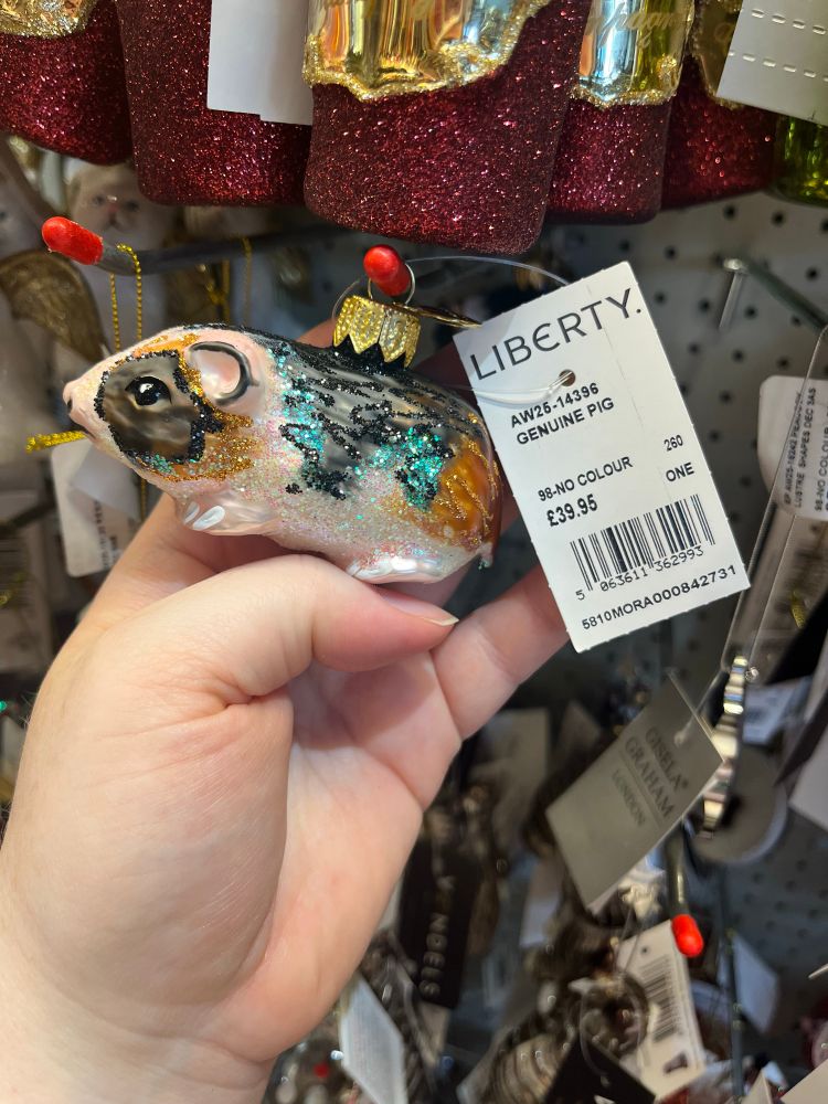 A guinea pig ornament labelled poorly