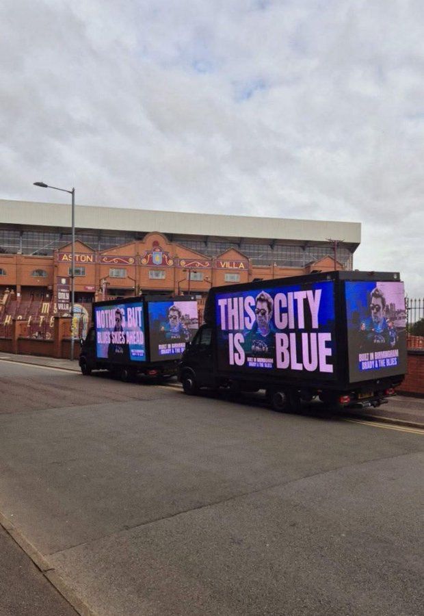 advertising vans promoting Small Heath Alliance aka Birmingham City's Amazon documentary parked outside the splendid, the magnificent Villa Park