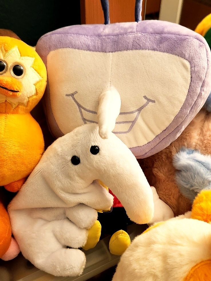 My Animal hanging out with Tenna plush.