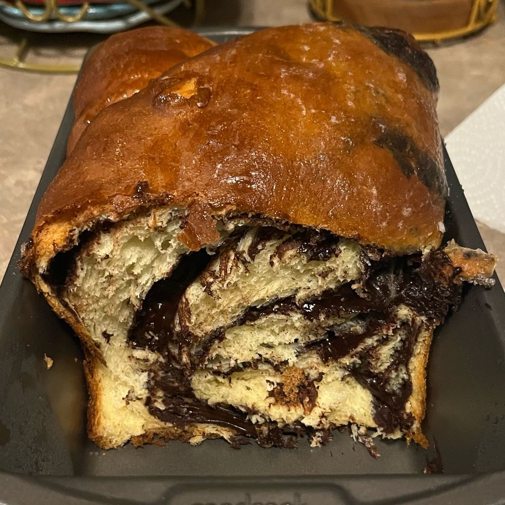 An up close shot of the sliced loaf, showing more in detail the chocolate swirls throughout