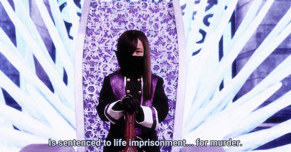 Rita from Ohsama Sentai King-Ohger sitting in their throne. The captions on screen read “Is sentenced to life imprisonment… for murder.”