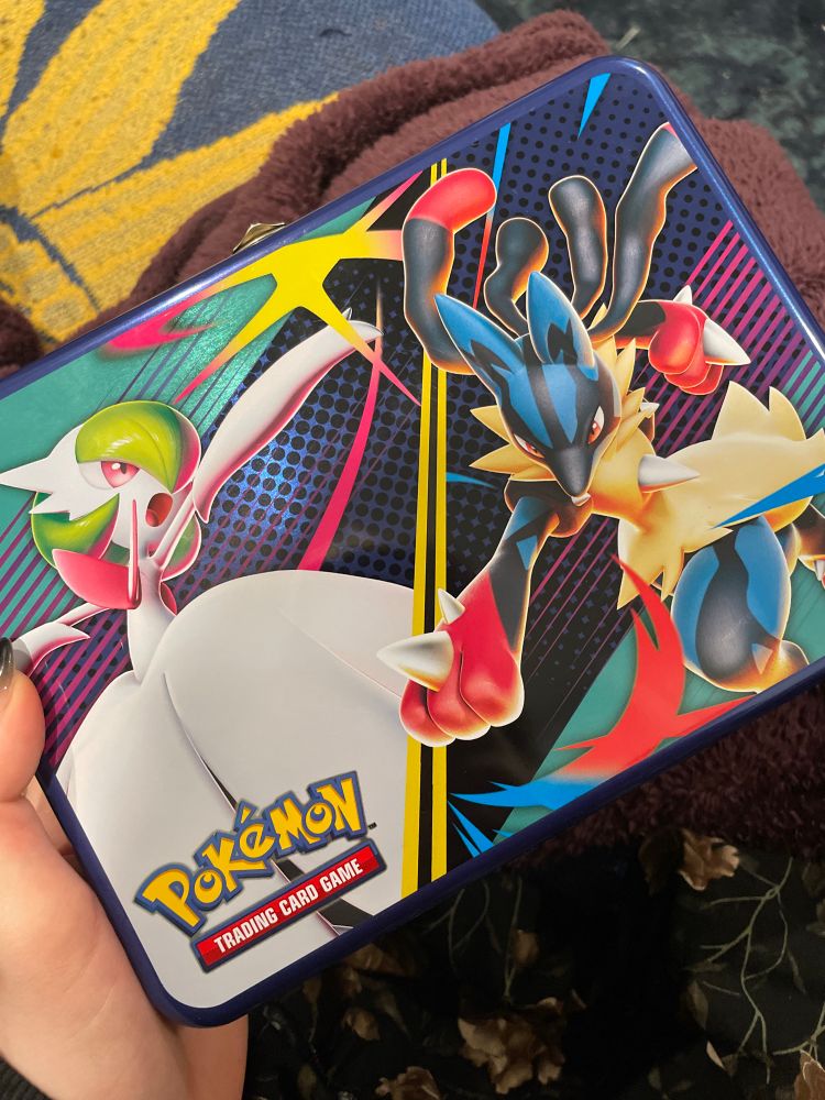 Pokémon trading card game metal lunch box with mega gardevoir and mega Lucario on the front 